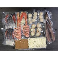 石狩鍋（秋鮭切身×8切、ゆでずわいがにカット×1袋、ボイル海老×12尾、ボイル帆立×6個、かに入つみれ×3個、えび入つみれ×3個、とりごぼうつみれ×3個、ツボ抜きいか×2尾、冷凍うどん×1玉、たれ（濃縮：味噌仕立て）×3袋） / 冷凍 送料無料 鍋セット